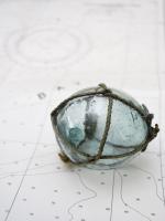 Glass fishing float on chart #SK113971 Glass fishing float on chart #SK113971
